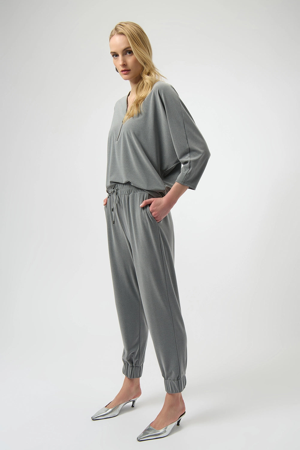 Joseph Ribkoff melange silky knit pull-on jogger with elastic waistband, elegant women’s casual pant style available at Hollie Rose.
