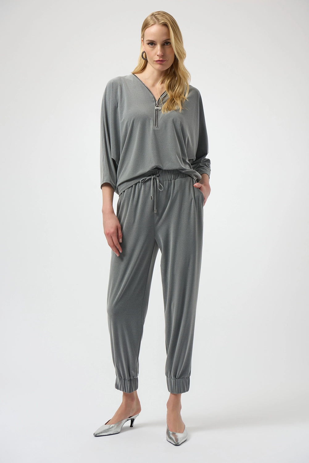 Joseph Ribkoff melange silky knit boxy top with V-neck zipper detail and dolman sleeves, relaxed women’s top available at Hollie Rose.
