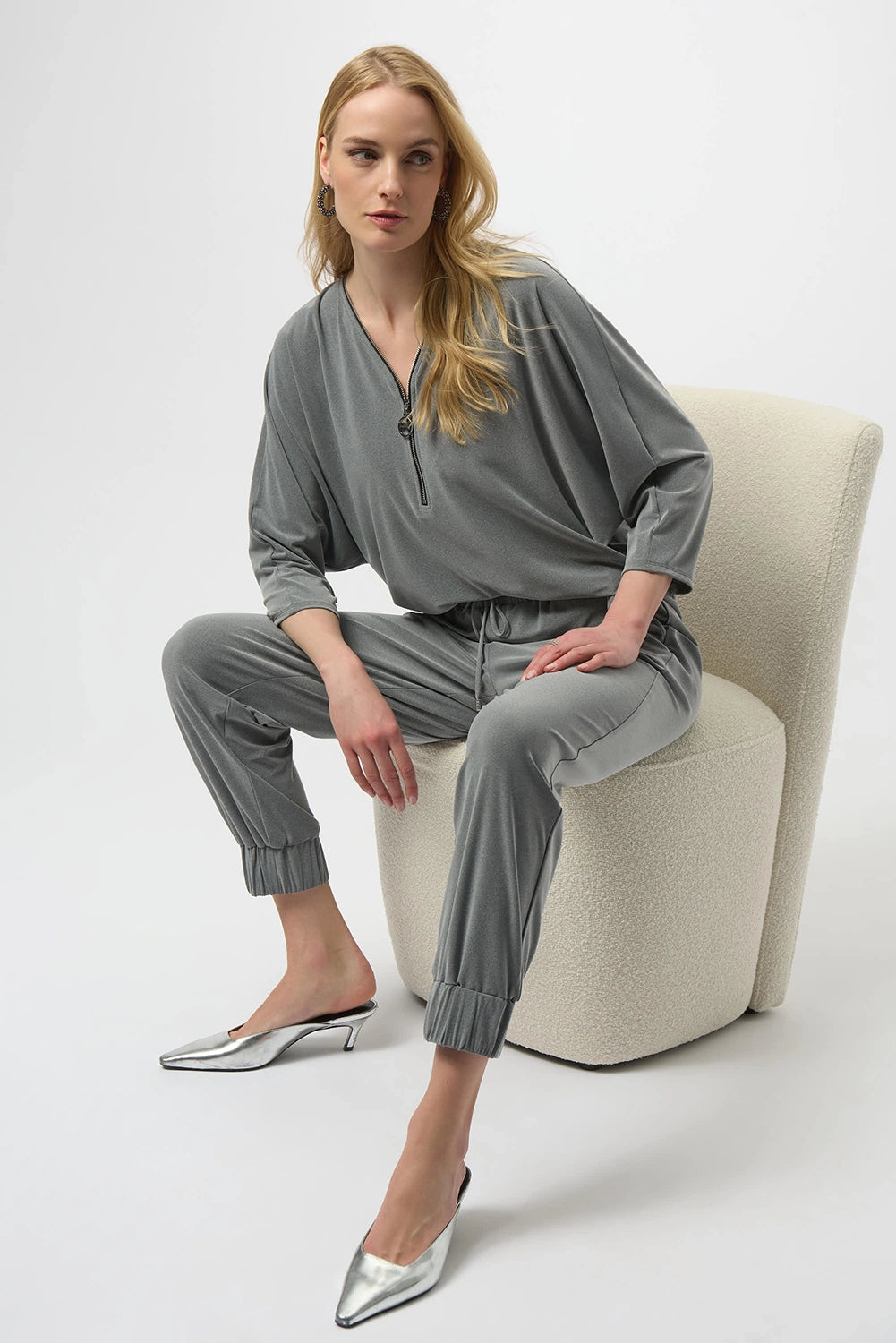 Joseph Ribkoff melange silky knit boxy top with V-neck zipper detail and dolman sleeves, relaxed women’s top available at Hollie Rose.
