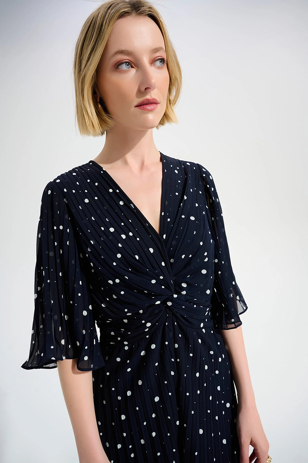 Joseph Ribkoff | Signature | Pleated Chiffon Dot Print Wide Leg Jumpsuit With Knot Detail  261756