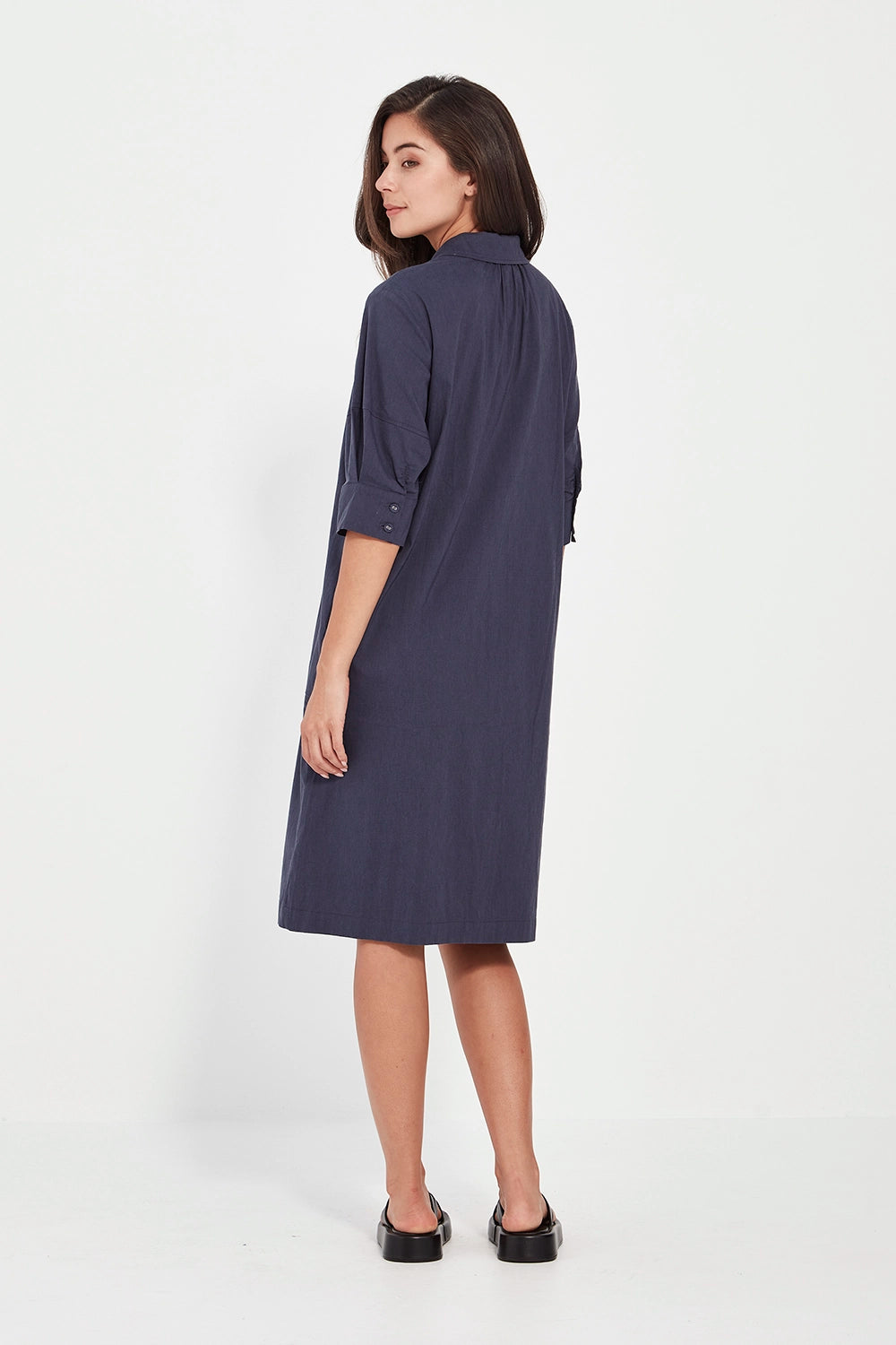 VERGE Acrobat Nori Dress in Denim Marle with collared neckline, button-through front and lantern sleeves, relaxed women’s dress at Hollie Rose.
