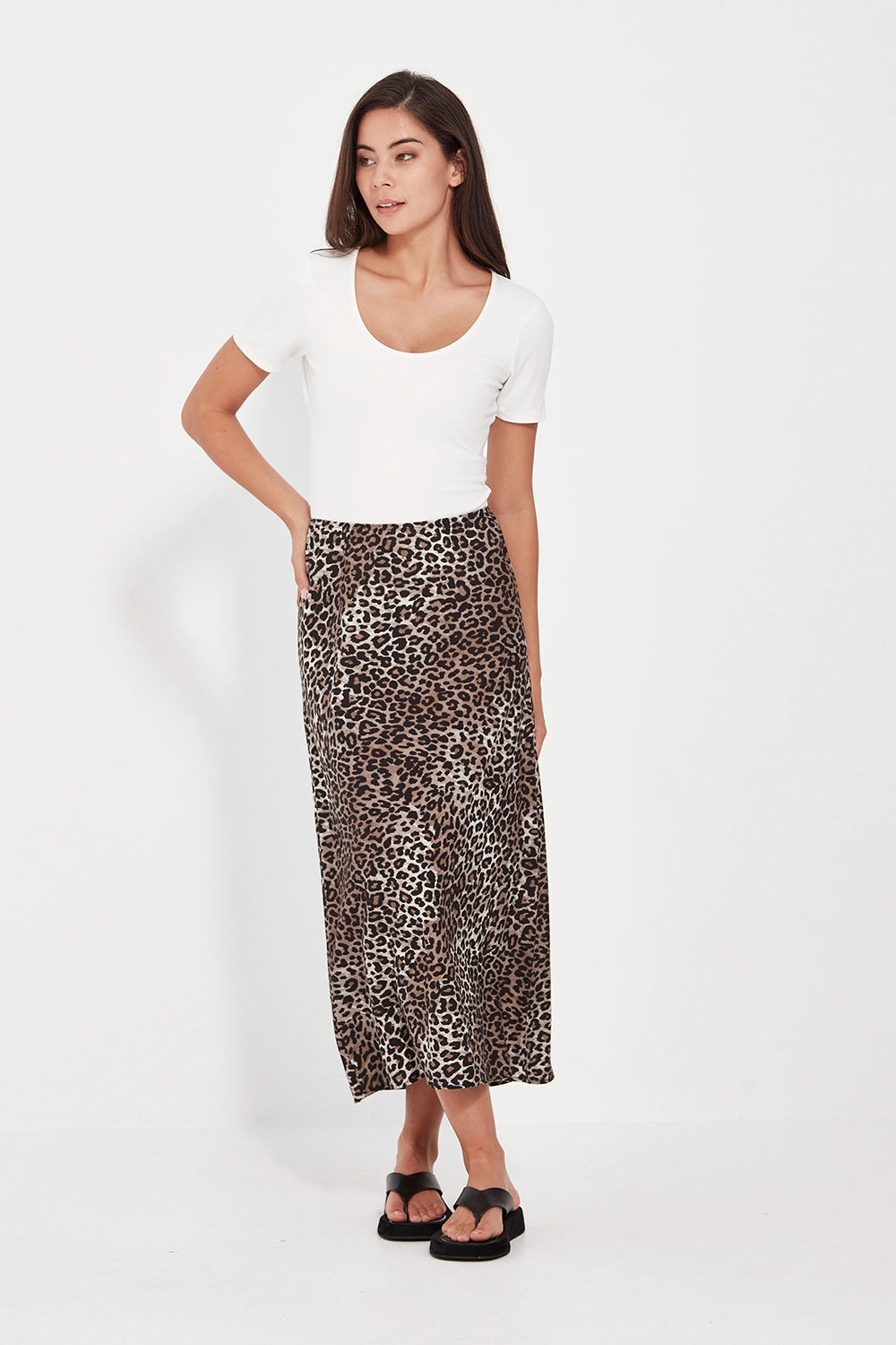 VERGE Instinct Skirt in exclusive animal print, bias-cut rayon-linen blend with mid-calf length and elastic waistband, women’s skirt at Hollie Rose.
