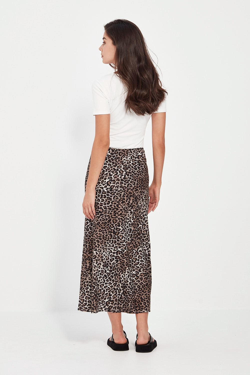 VERGE Instinct Skirt in exclusive animal print, bias-cut rayon-linen blend with mid-calf length and elastic waistband, women’s skirt at Hollie Rose.