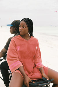 Shop Kinga Csilla Team KC Tee Dress in washed cotton with sporty stripe sleeves, relaxed V-neck and oversized fit at Hollie Rose. Free Shipping, Afterpay & ZipPay.
