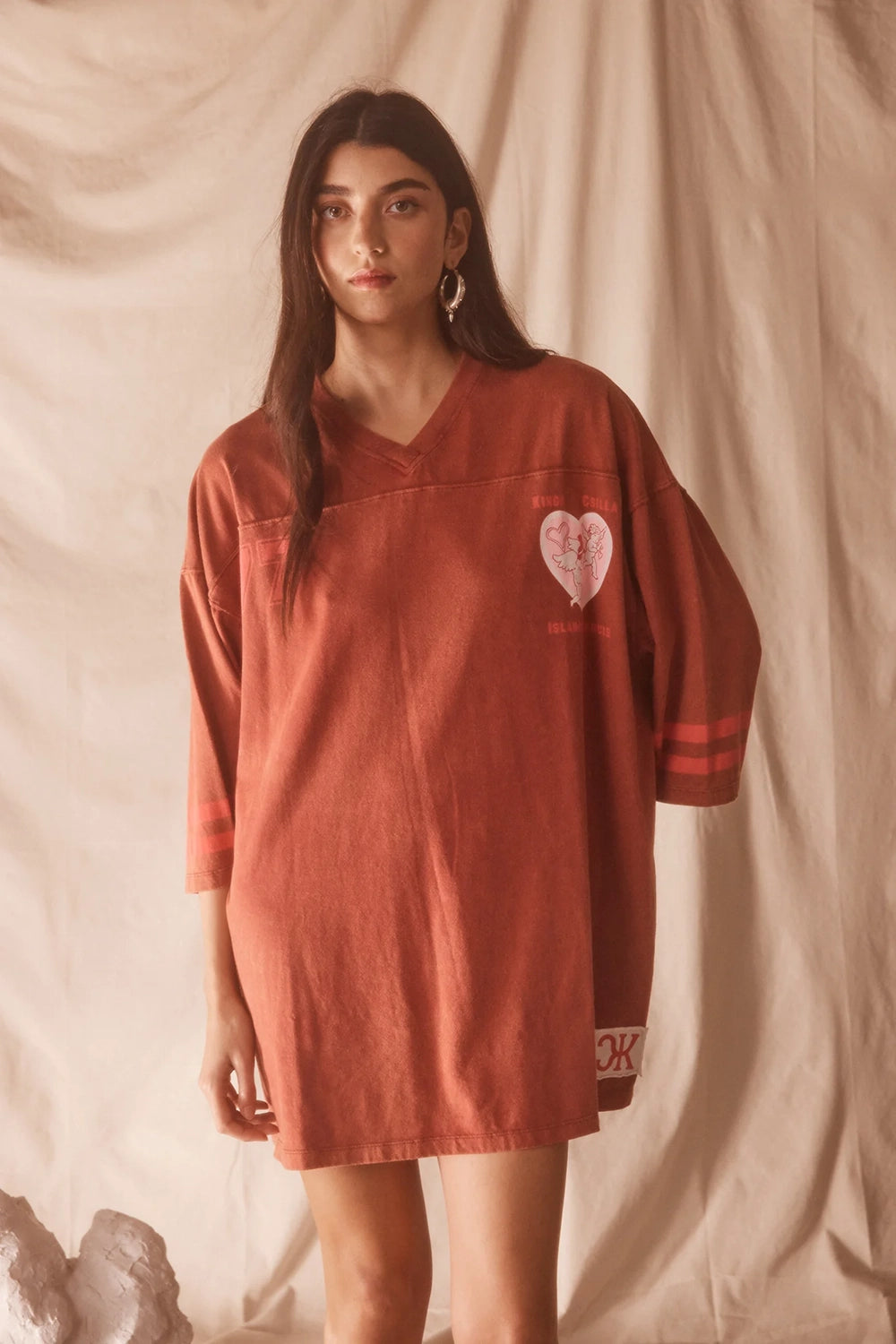 Shop Kinga Csilla Team KC Tee Dress in washed cotton with sporty stripe sleeves, relaxed V-neck and oversized fit at Hollie Rose. Free Shipping, Afterpay & ZipPay.
